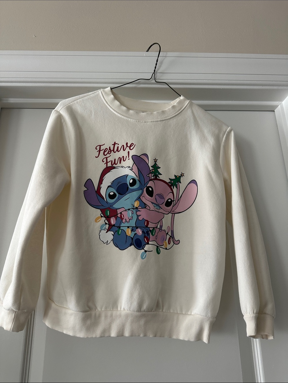 H&M Kids Cream Sweatshirt with Blue & Pink Stitch & Angel Graphic